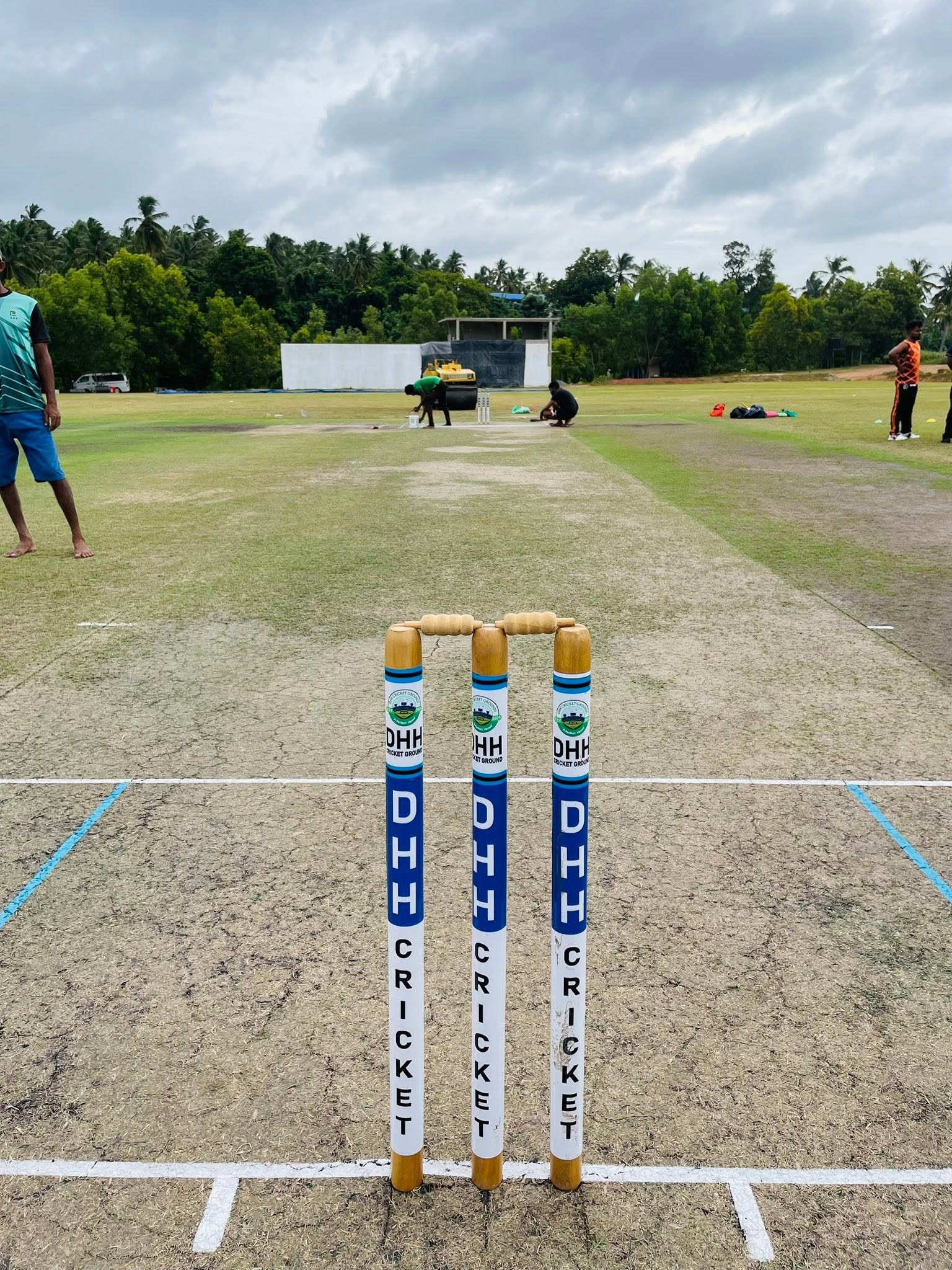 DHH branded stumps on the curated turf at DHH Turf Cricket Grounds Negombo Sri Lanka