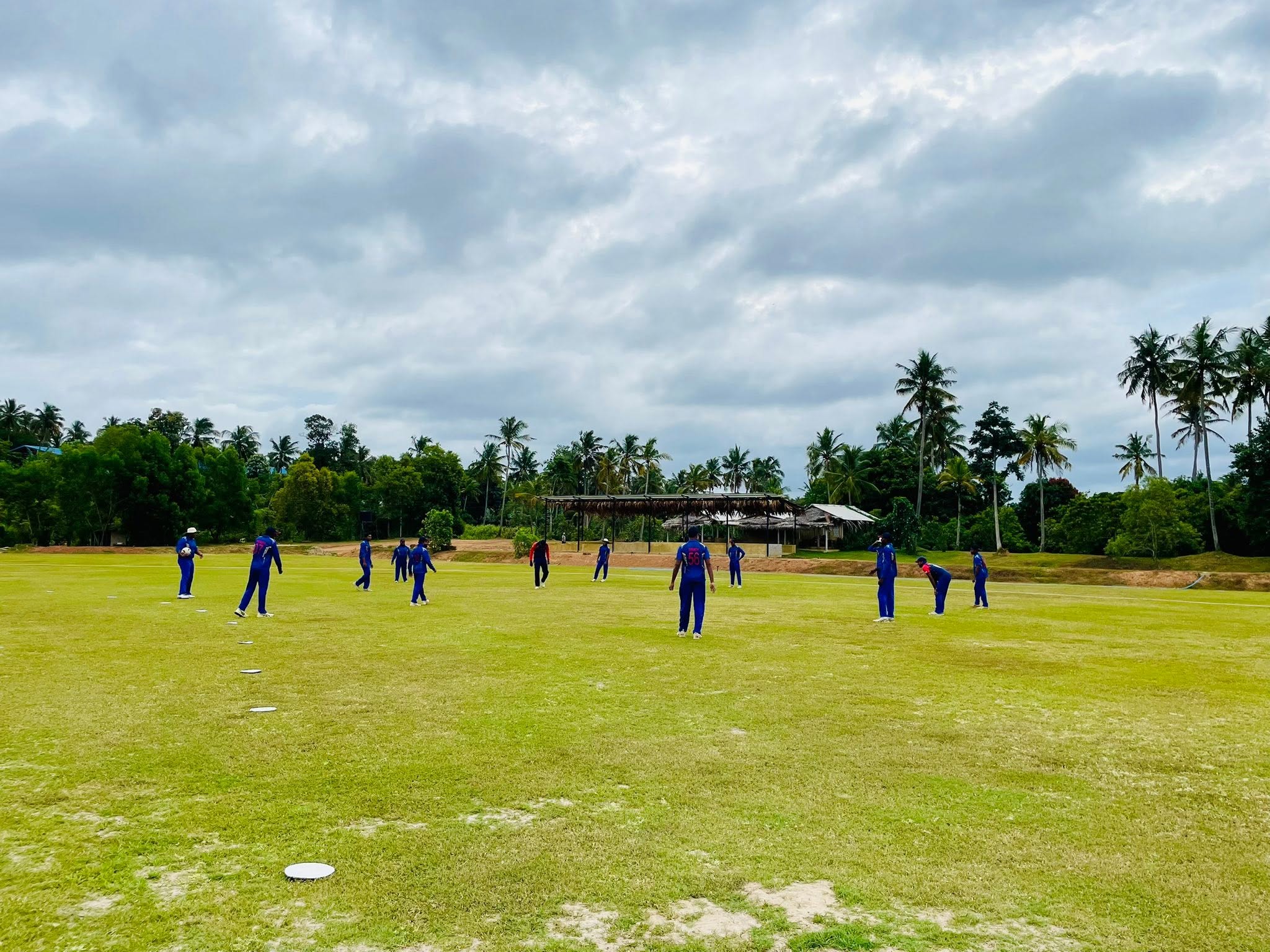 Match-day fielding on the lush outfield - DHH Turf Cricket Grounds Negombo Sri Lanka