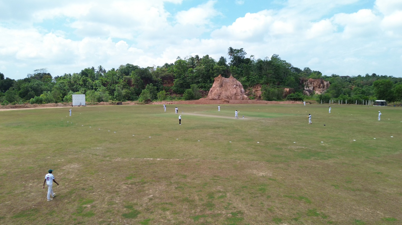 Wide drone view of live match action - DHH Turf Cricket Grounds Negombo Sri Lanka